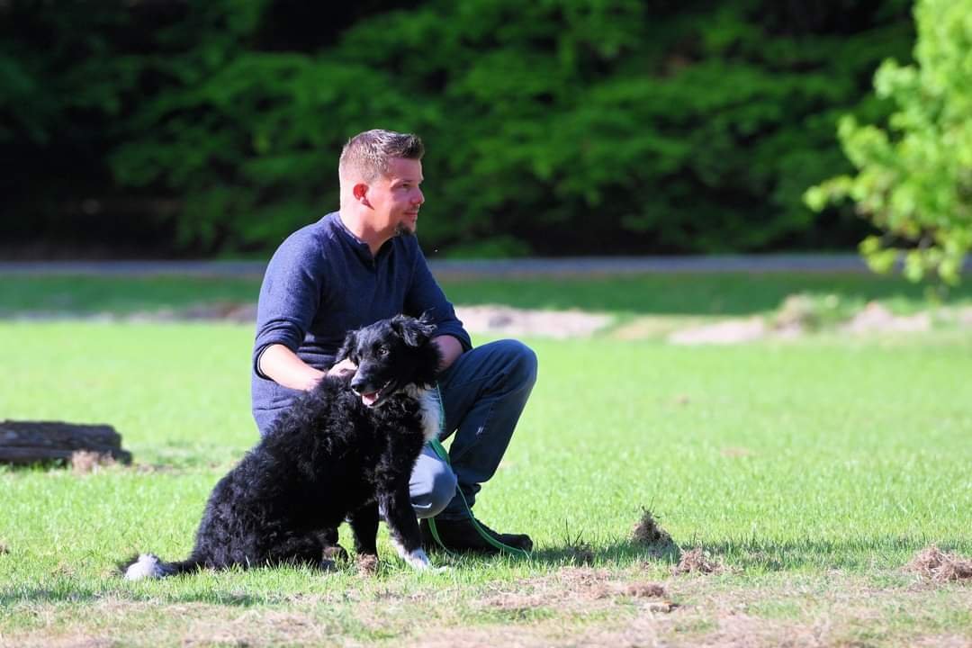 Wim outside with his dog